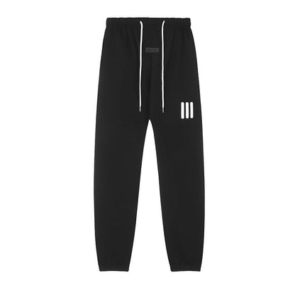 ESSENTIALS Three Stripes Sweatpants